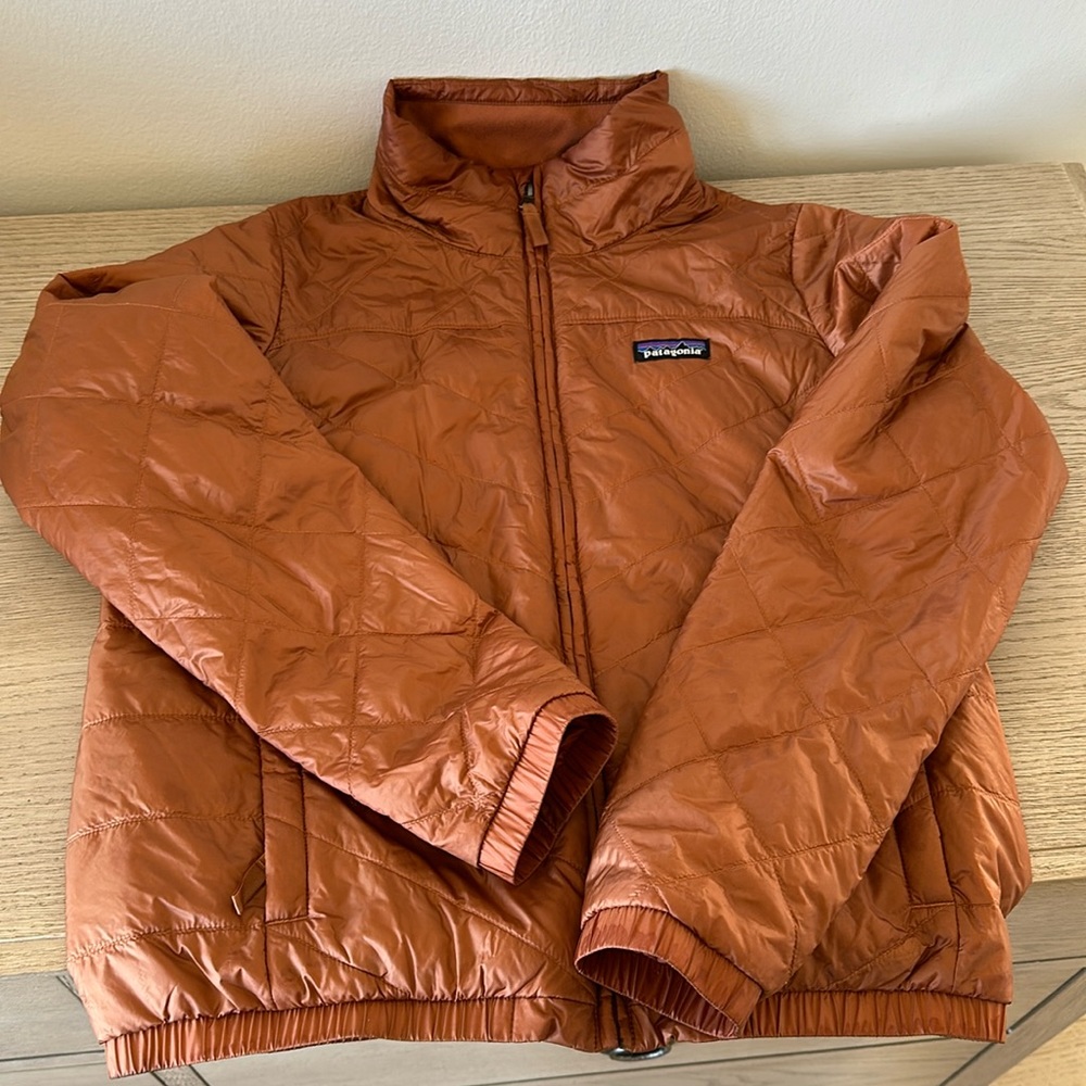 Rust/copper colored Patagonia jacket